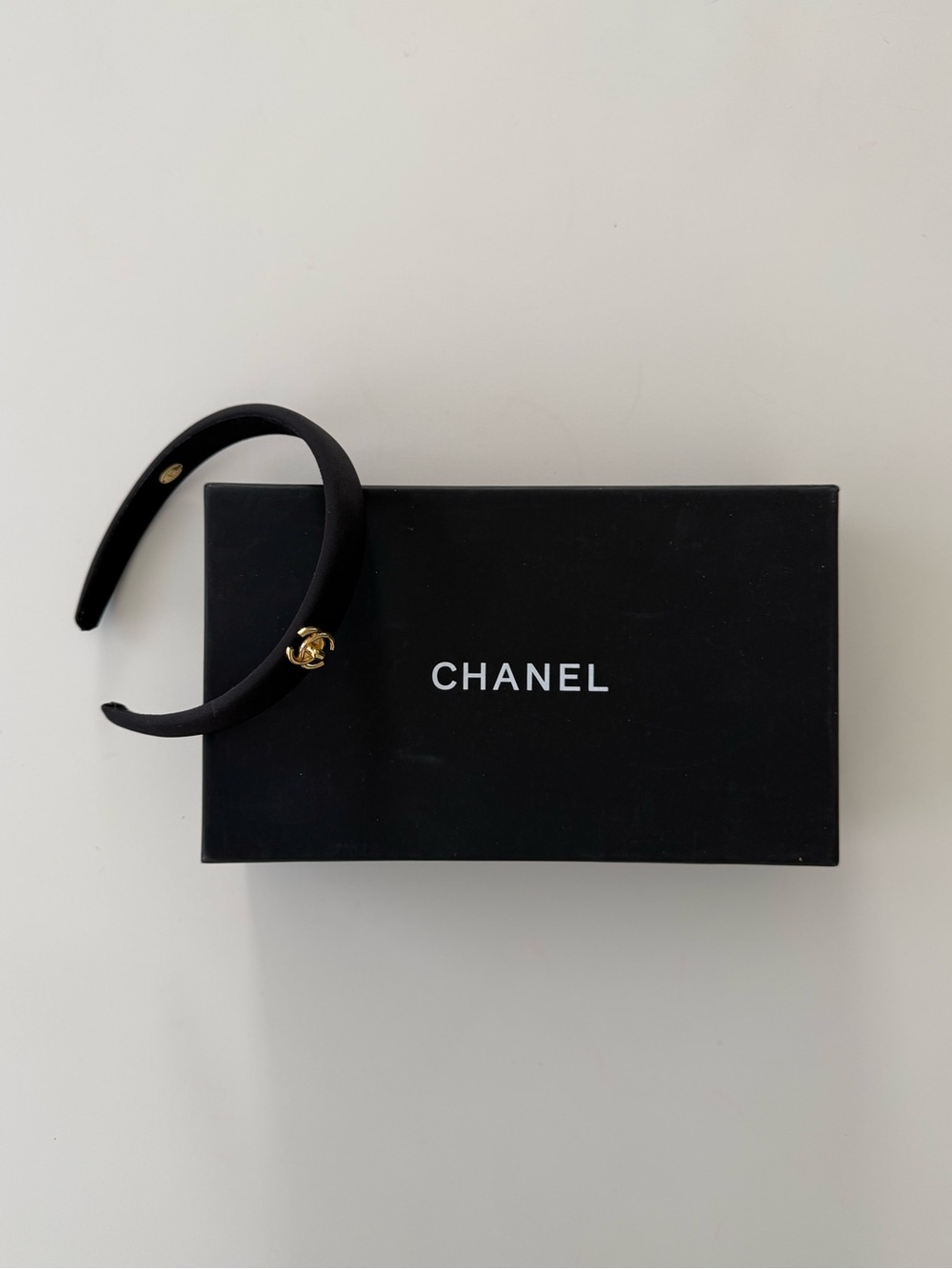 CHANEL Black Headband with Gold CC Charm